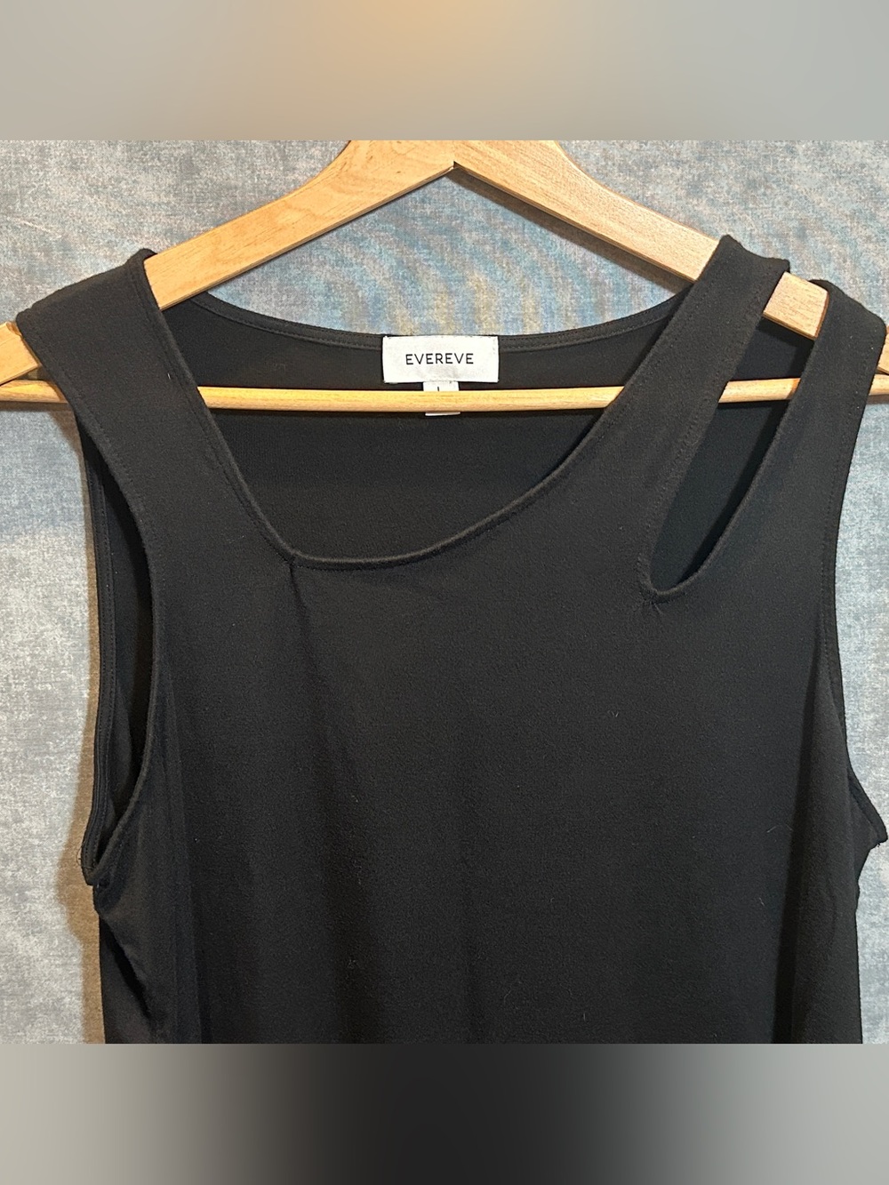 Evereve black tank top with shoulder cutout in size L